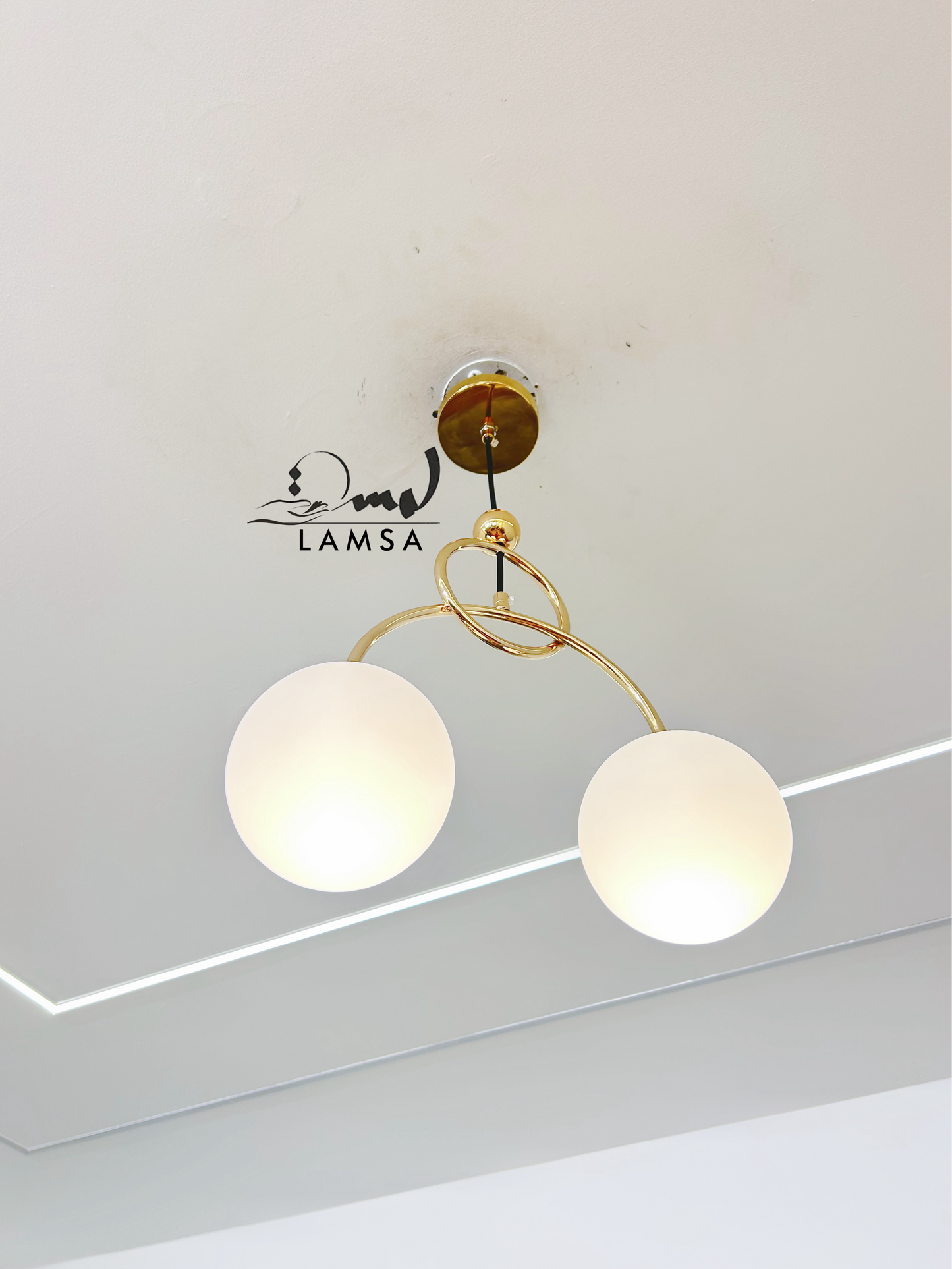 Lustre une Boule en Métal Bronze